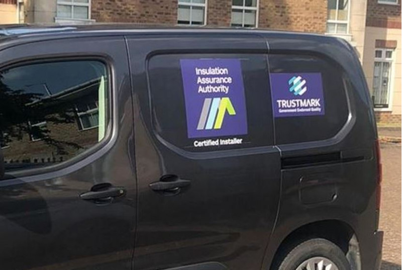 A van with The Insulation Assurance Authority (IAA) and TrustMark logo